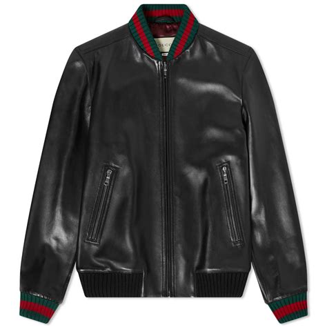 Military cloth jacket with Gucci label in black .